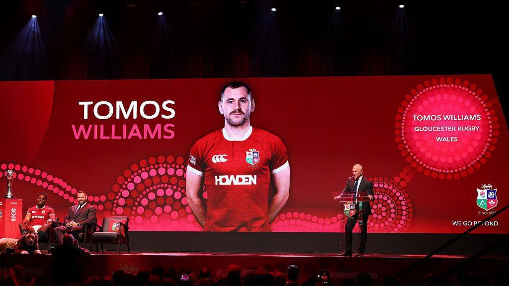 Tomos Williams' name appears on screen as he is announced out at the British and Irish Lions' squad ceremony