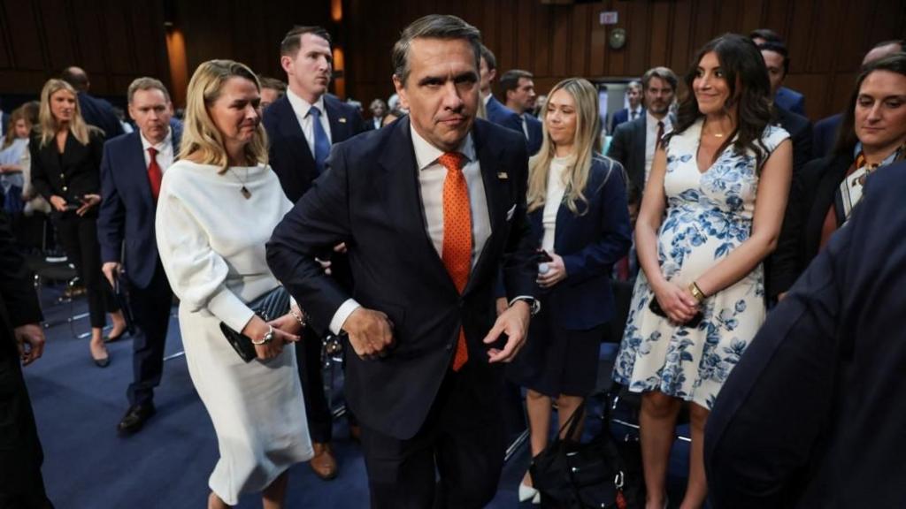 Acting U.S. Attorney General Todd Blanche, flanked by his wife Kristine Blanche, leaves after testifing before a Senate Judiciary Committee confirmation hearing on his nomination to be attorney general