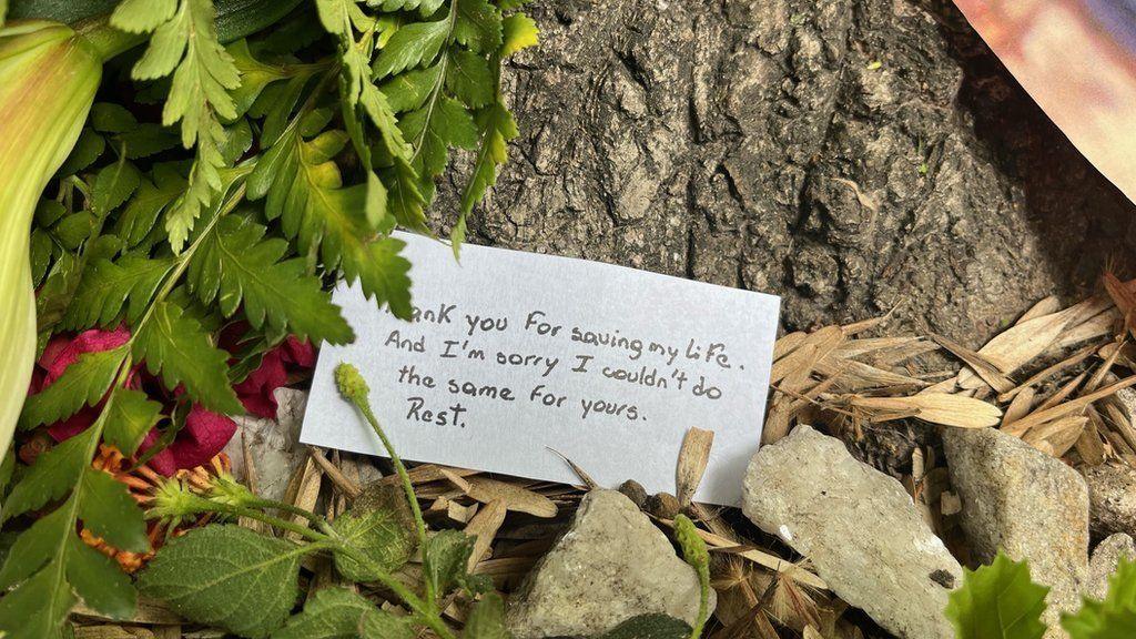 One of the notes left outside the hotel reads: "Thank you for saving my life. And I'm sorry I couldn't do the same for yours. Rest."