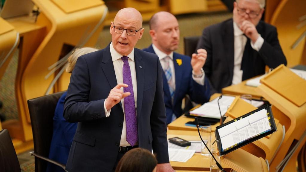 John Swinney gesticulating at First Minister's Questions 