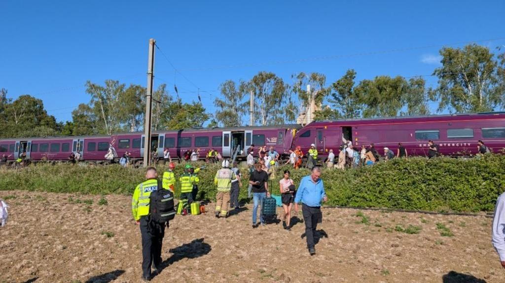 People leaving train following Bedford train crash
