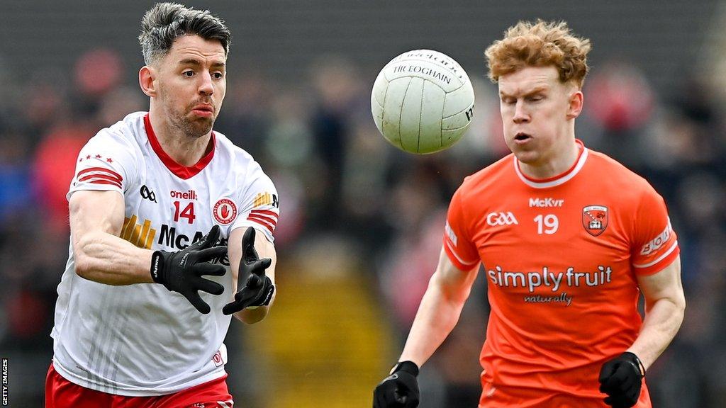 Tyrone's Mattie Donnelly and Armagh's Conor Turbitt in action at Healy Park