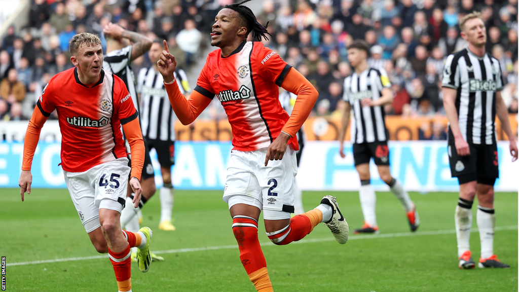 Gabriel Osho of Luton Town celebrates scoring his team's first goal during the Premier League match between Newcastle United and Luton Town