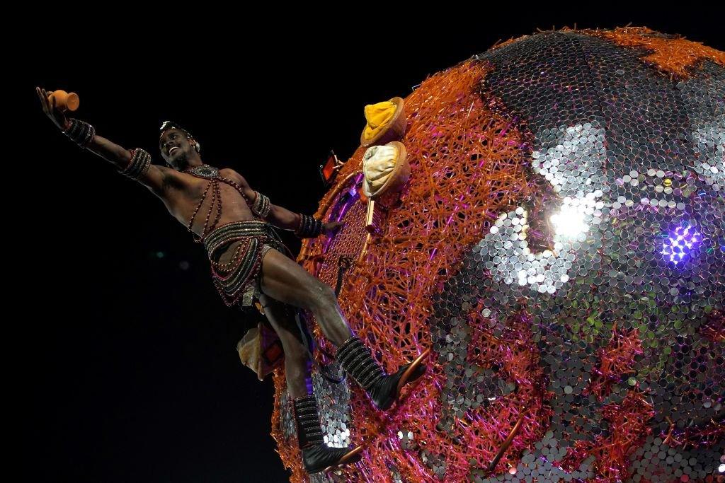 Members of Grande Rio samba school perform during the second night of Rio's Carnival parade at the Sambadrome Marques de Sapucai in Rio de Janeiro on April 24, 2022.