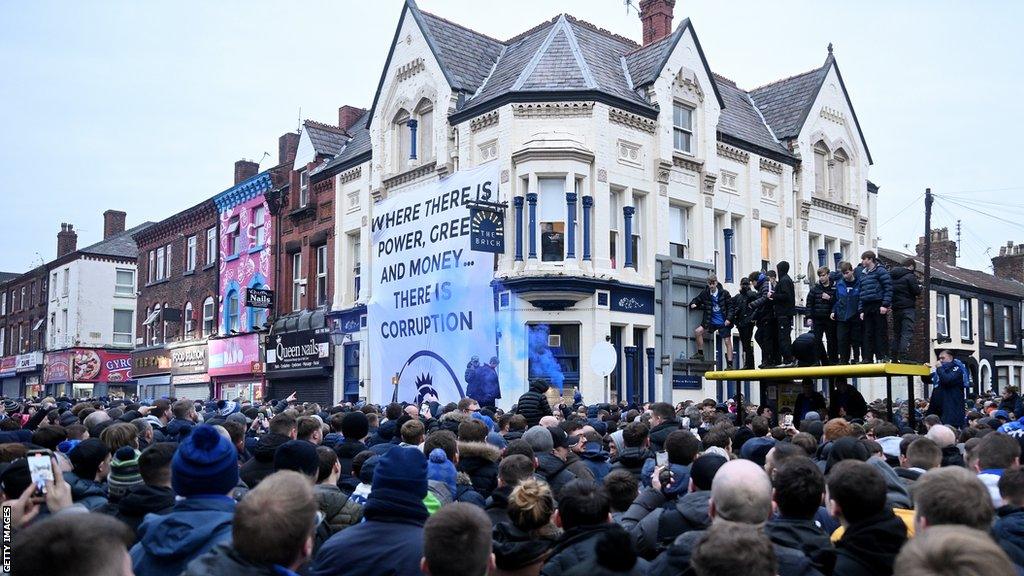 Everton fans protesting outside a pub near Goodison Park