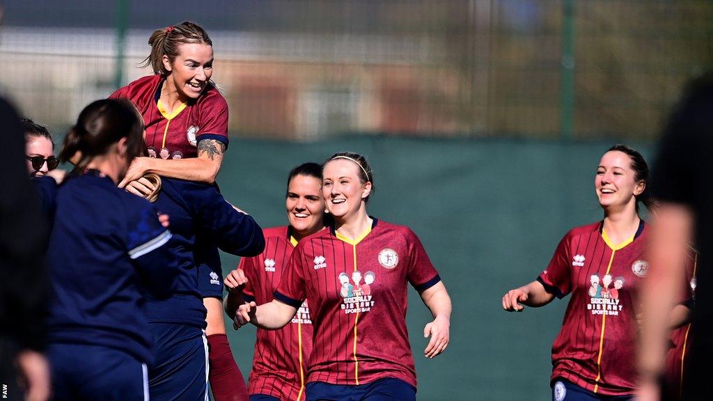 Emily Allen celebrates scoring the only goal in last season's Adran Trophy final