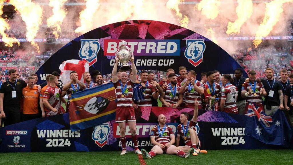 Wigan Warriors celebrate winning the Challenge Cup