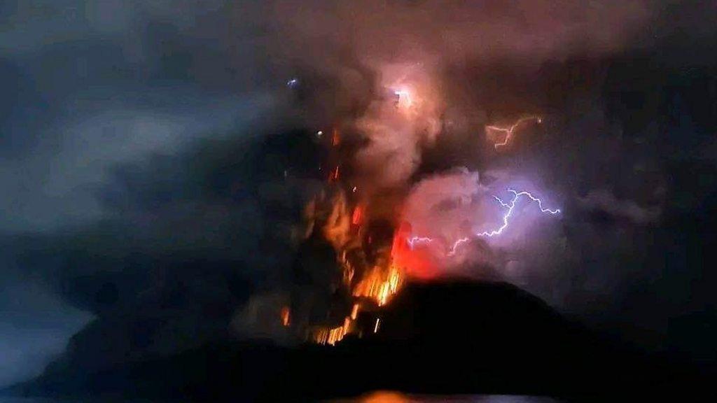 Erupted volcano with lightning