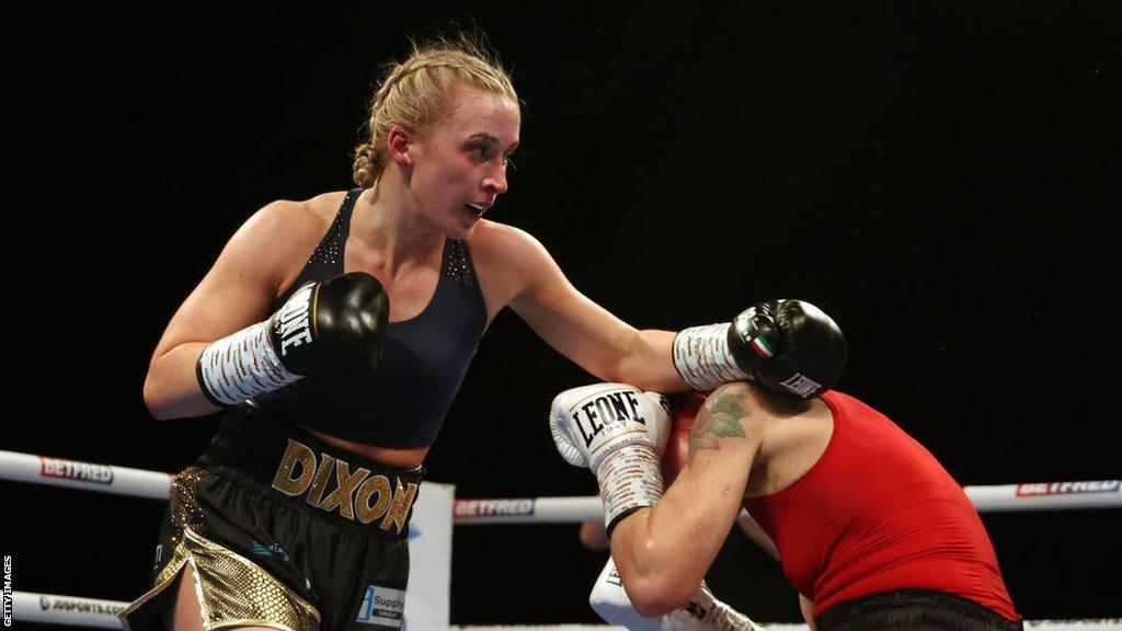 Rhiannon Dixon lands a punch on Kristine Shergold during their lightweight fight in Leeds on 10 December 2022