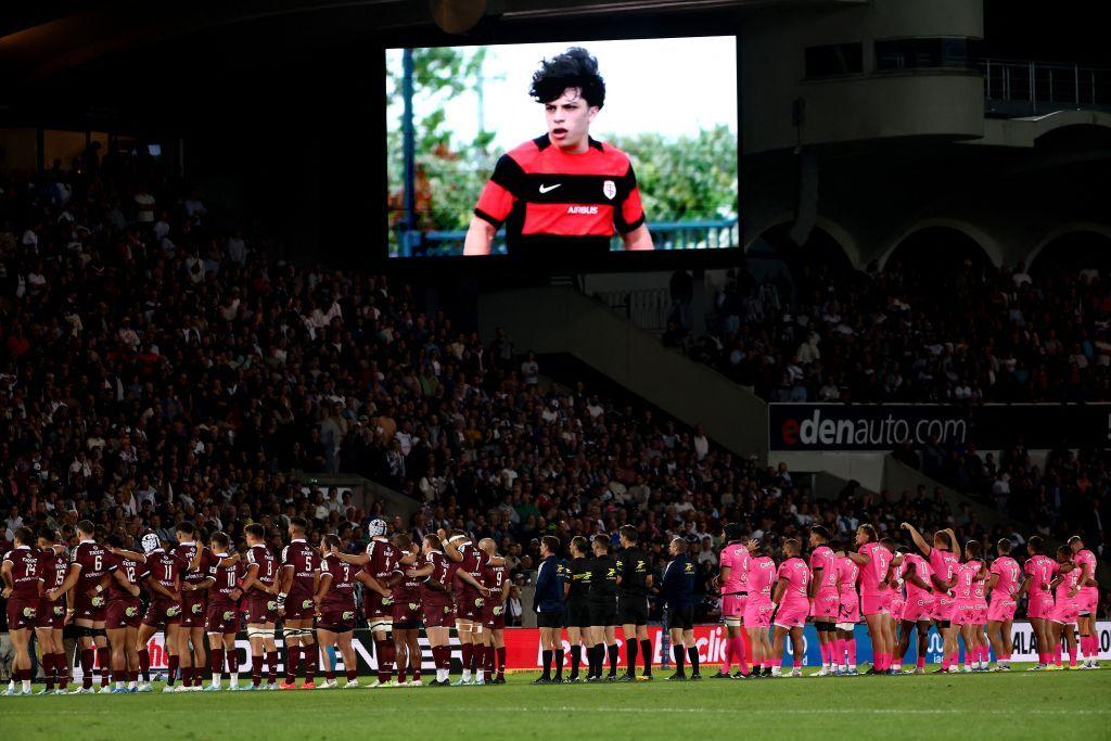 Stade Francais and Bordeaux hold a minute's silence before a Top 14 game with a picture of Medhi Narjissi on the big screen