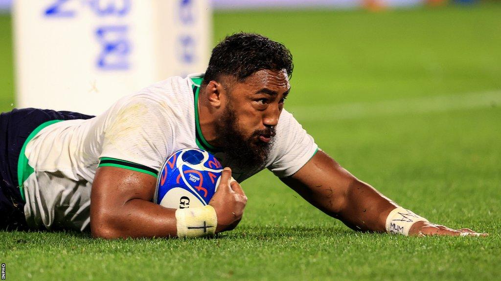 Bundee Aki scored two tries as Ireland stormed to a bonus-point win over Tonga in Nantes