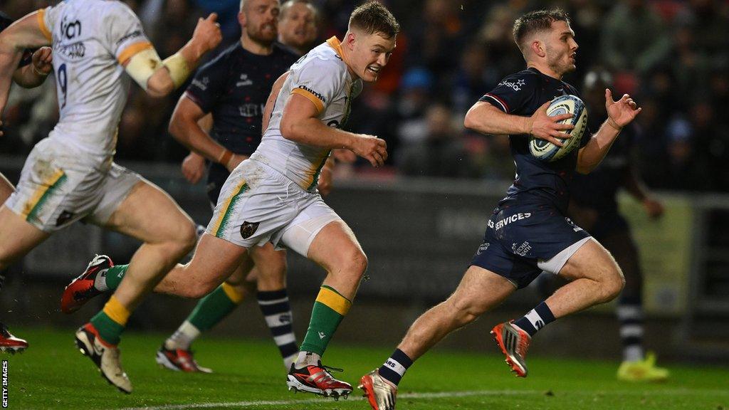 Harry Randall sprints to score a try for Bristol