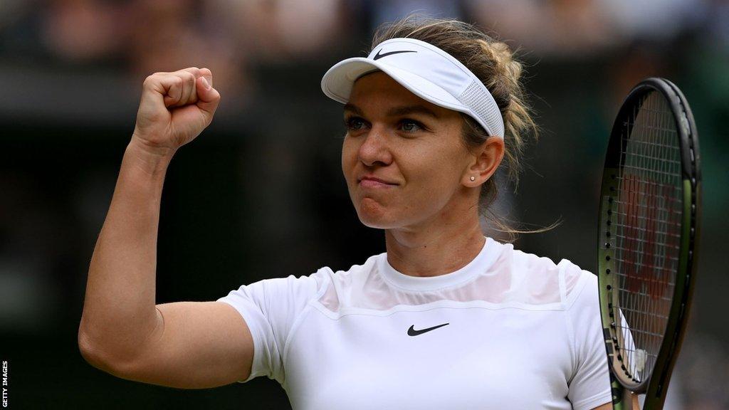 Simona Halep celebrates winning Wimbledon in 2019