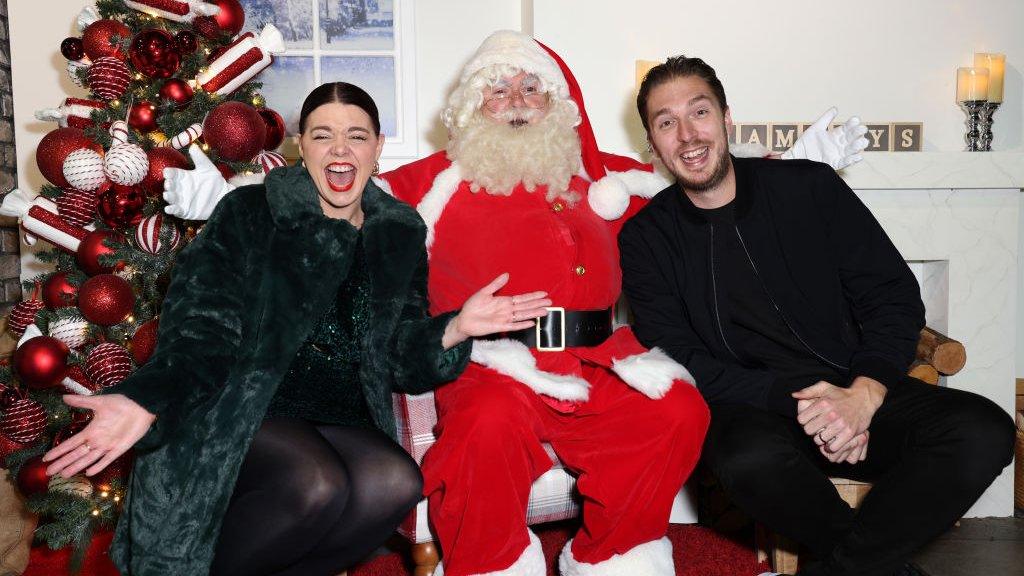 Lad Baby and Roxanne, with Santa