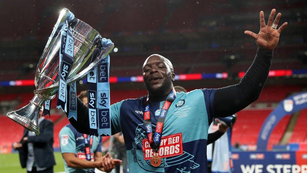 Adebayo Akinfenwa celebrates promotion