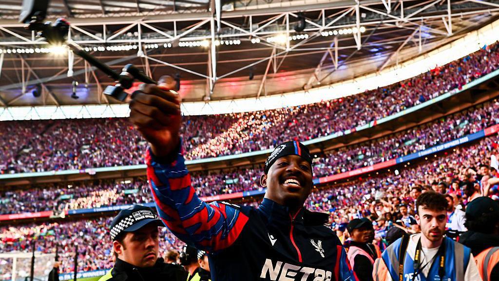 Jean Philippe Mateta celebrates winning the FA Cup with the Crystal Palace fans