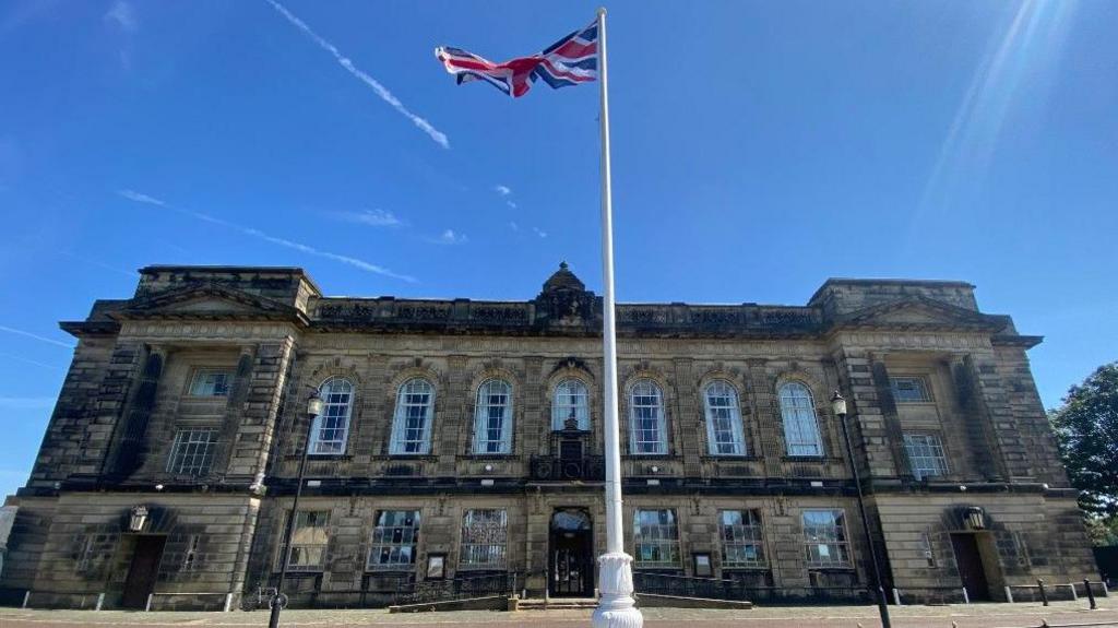 Wallasey Town Hall complete with Union flag flying in front of it