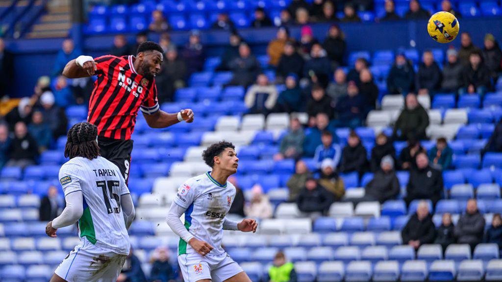 Jamille Matt scores a header