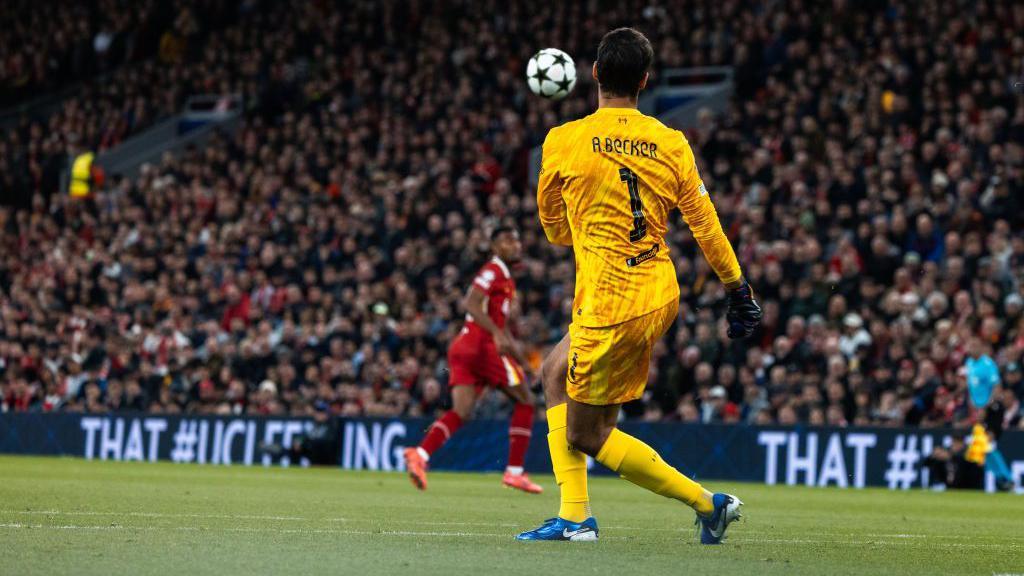 Alisson in action for Liverpool