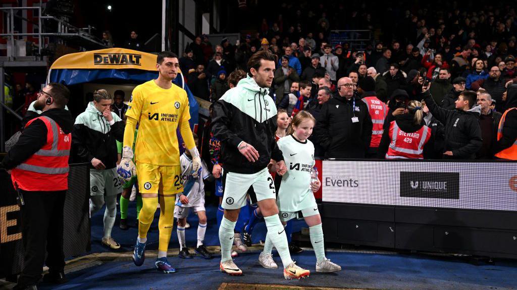 Ben Chilwell leads his Chelsea side onto the pitch prior to the Premier League match against Crystal Palace at Selhurst Park