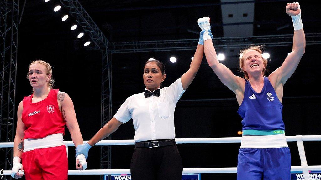 Amy Broadhurst (left) shows her disappointment after being beaten by Great Britain's Rosie Joy Eccles in her welterweight quarter-final at the European Games