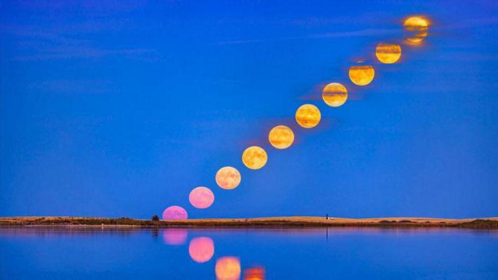 Timelapse of a reflected full moon rise