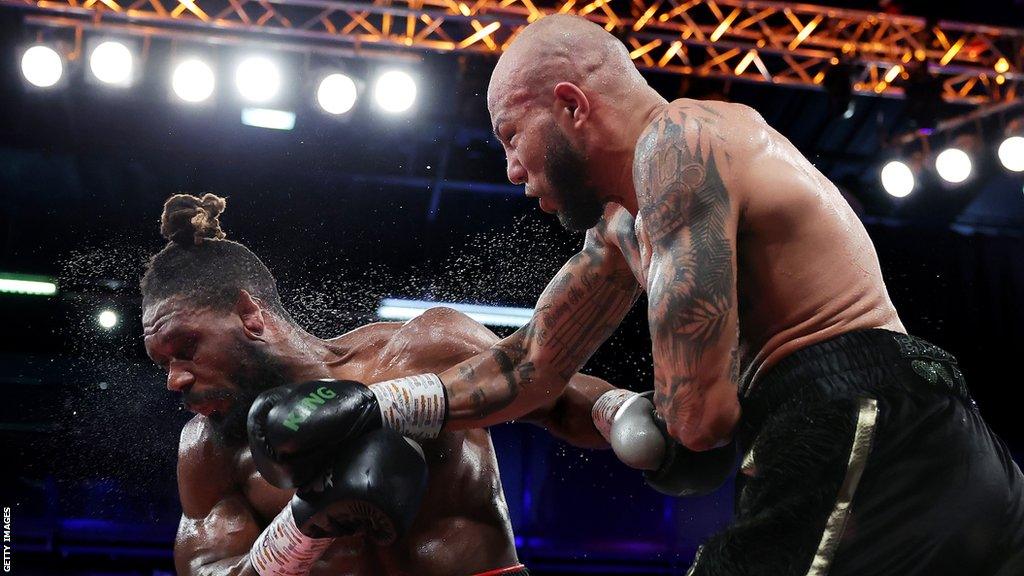 Lyndon Arthur lands punch against Boris Crighton