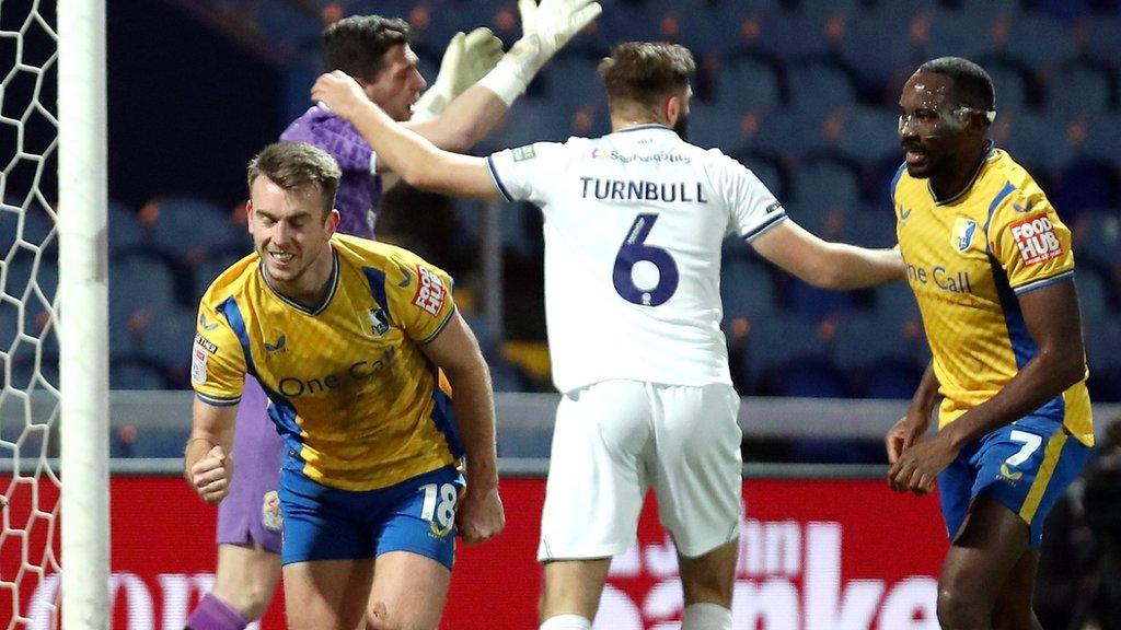 Rhys Oates celebrated the first of Mansfield's two equalisers eight minutes before the break