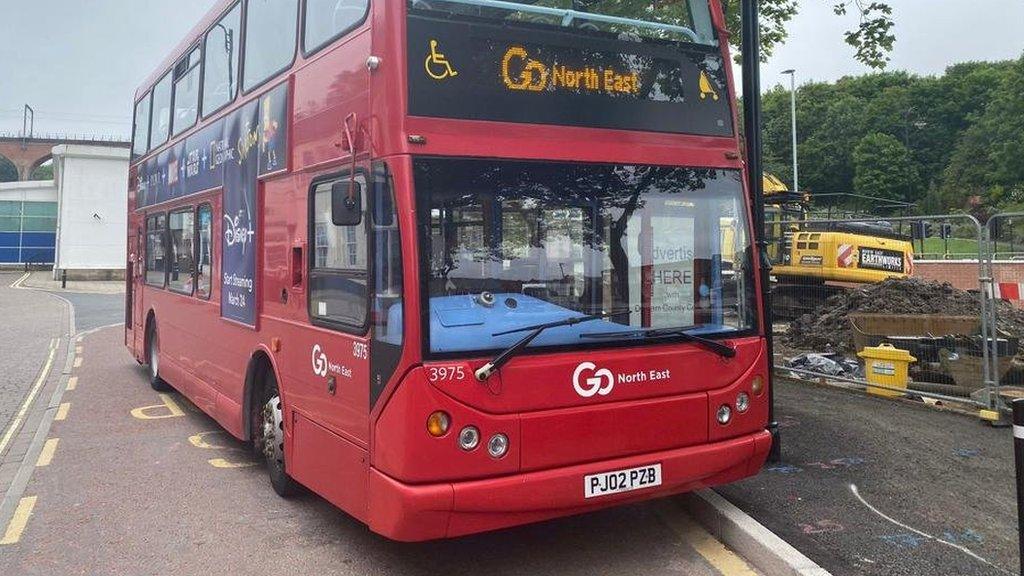 A red Go North East bus in Chester-le-Street