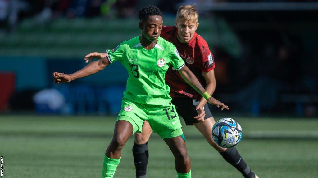 Quinn plays for Canada against Nigeria