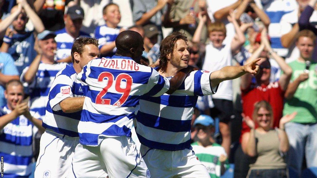 Gareth Ainsworth (right) celebrates a goal for QPR with team-mates