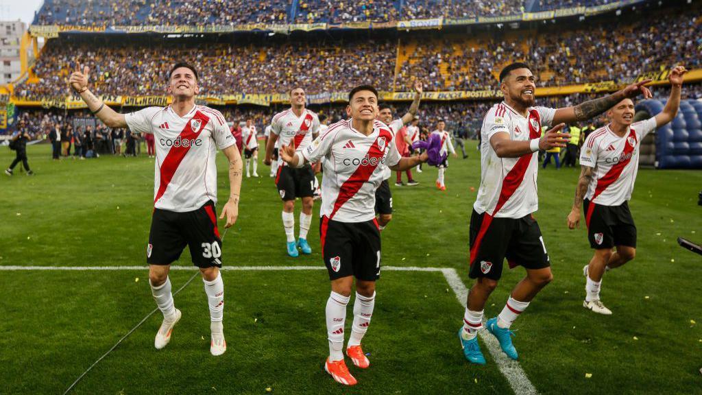River Plate players celebrate beating Boca Juniors in September 2024