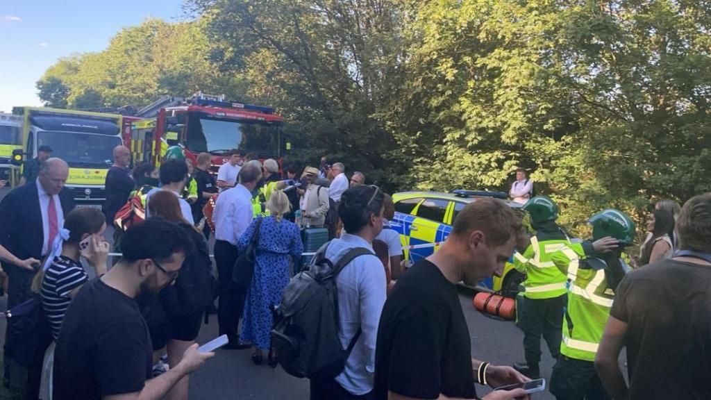 People standing around after incident