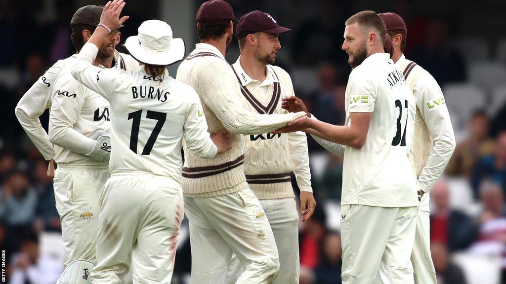 Surrey celebrate wicket