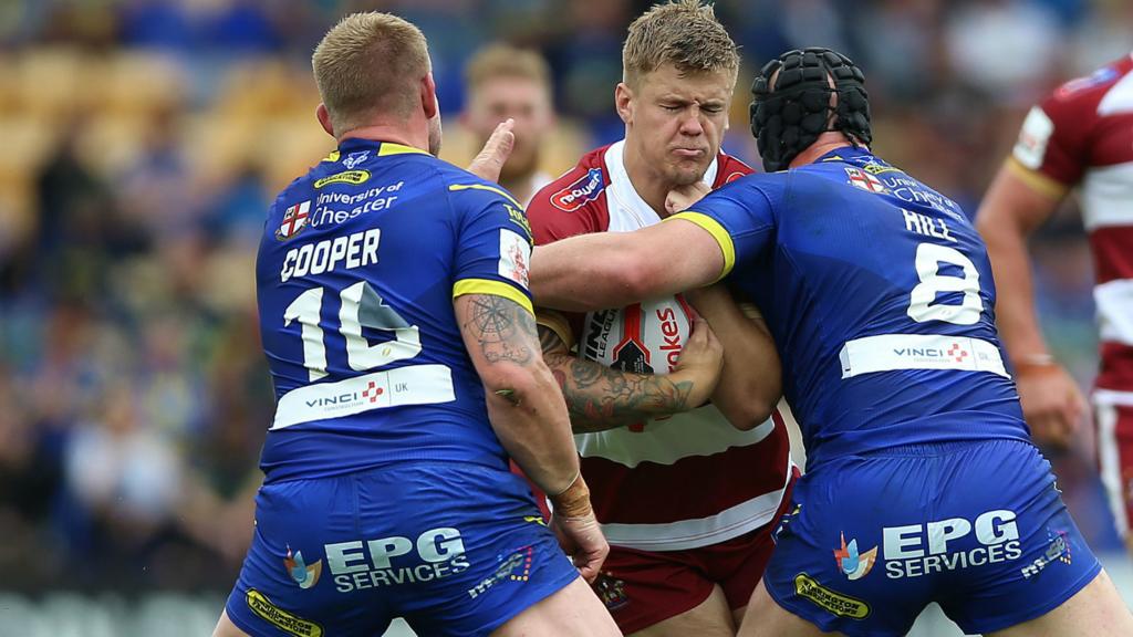 Wigan's Ryan Sutton is tackled