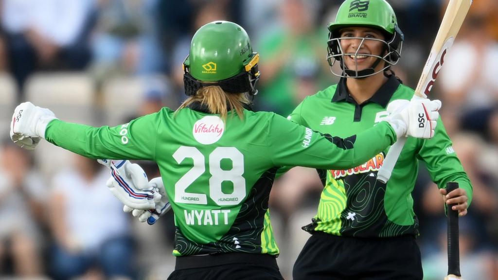 Southern Brave openers Danni Wyatt (left) and Smriti Mandhana (right) embrace after beating Trent Rockets