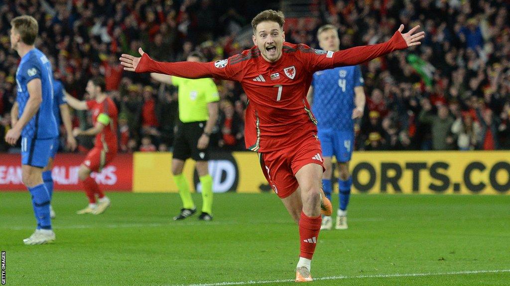 David Brooks celebrating after scoring against Finland