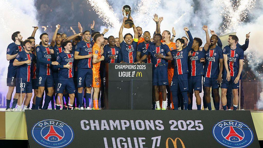 Paris St-Germain with the Ligue 1 trophy