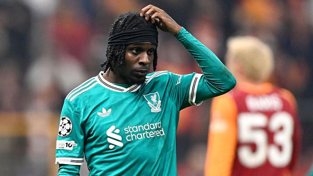 Jeremie Frimpong looks on with hand to head during match