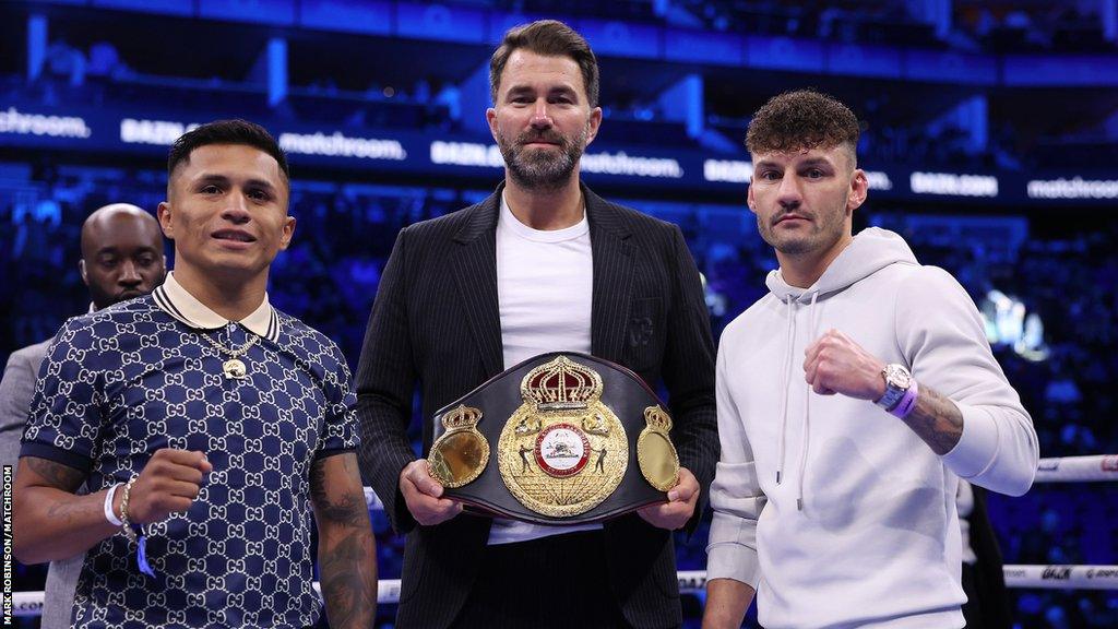 Mauricio Lara faces off with Leigh Wood in the ring