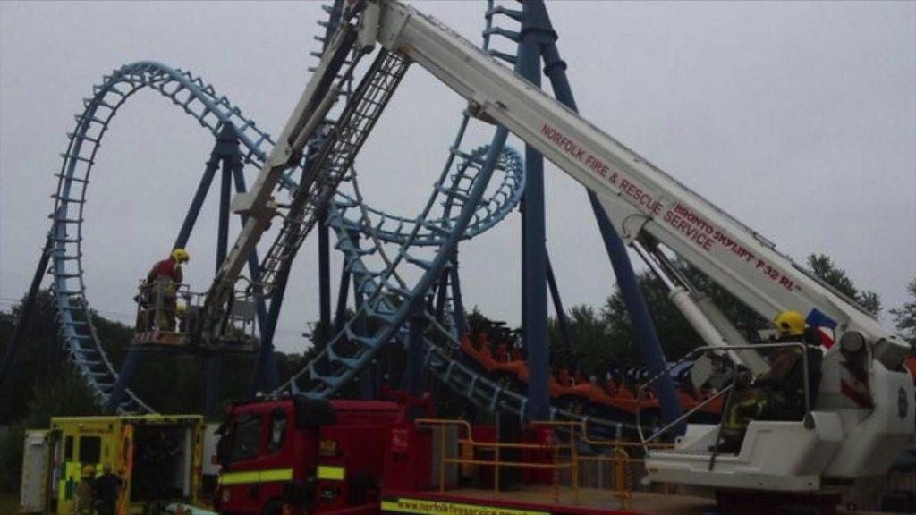 Firefighters rescue man from rollercoaster