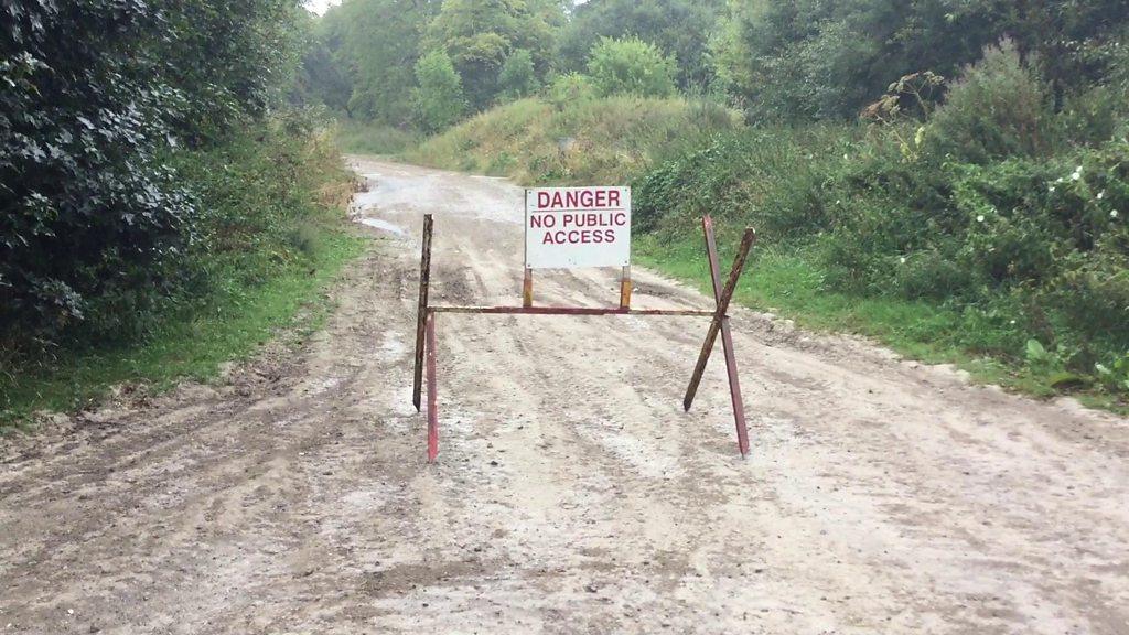 Road with danger sign