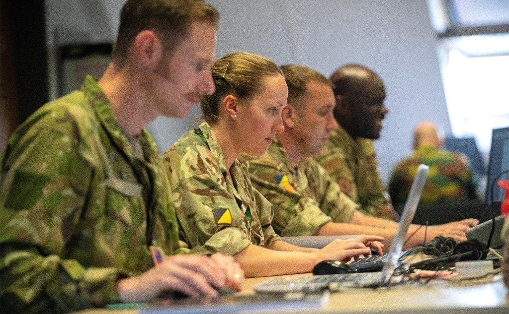 EUCOM Control Center – Ukraine / International Donor Coordination Centre staff members from the United Kingdom and United States, Patch Barracks, Germany, 3 June 2022