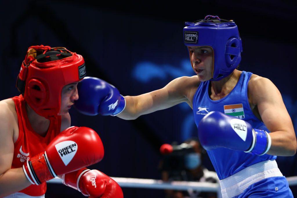  Oyuntsetseg Yesugen of Uzbekistan (red) in action against Jaismine of India in the Women's Feather (54-57kg)preliminary bout on Day Two of the Asian Boxing Championships on May 25, 2021 in Dubai, United Arab Emirates. (Photo by Francois Nel/Getty Images)