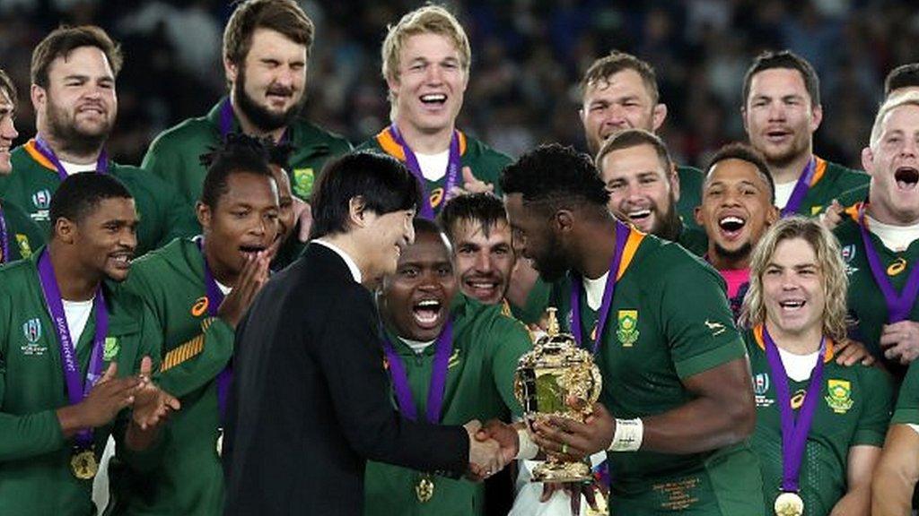 Siya Kolisi about to lift the World Cup after South Africa beat England