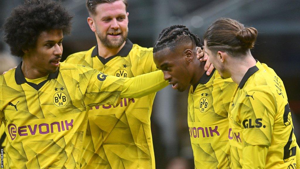 Borussia Dortmund celebrate after Jamie Bynoe-Gittens scores