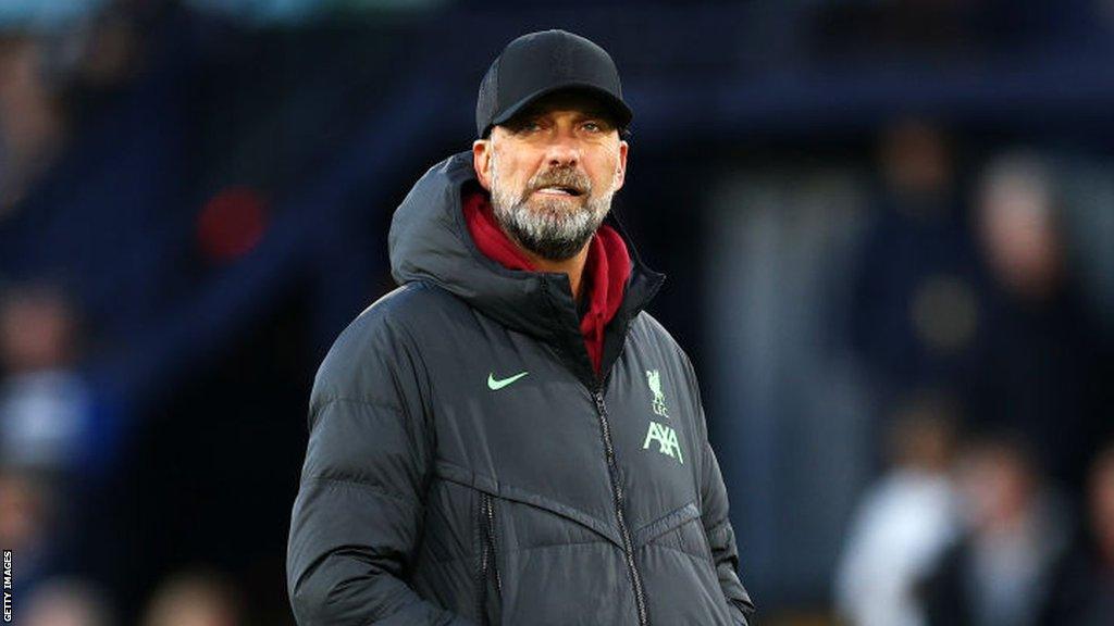 Liverpool boss Jurgen Klopp watches Luton Town warm up before the Premier League match at Kenilworth Road