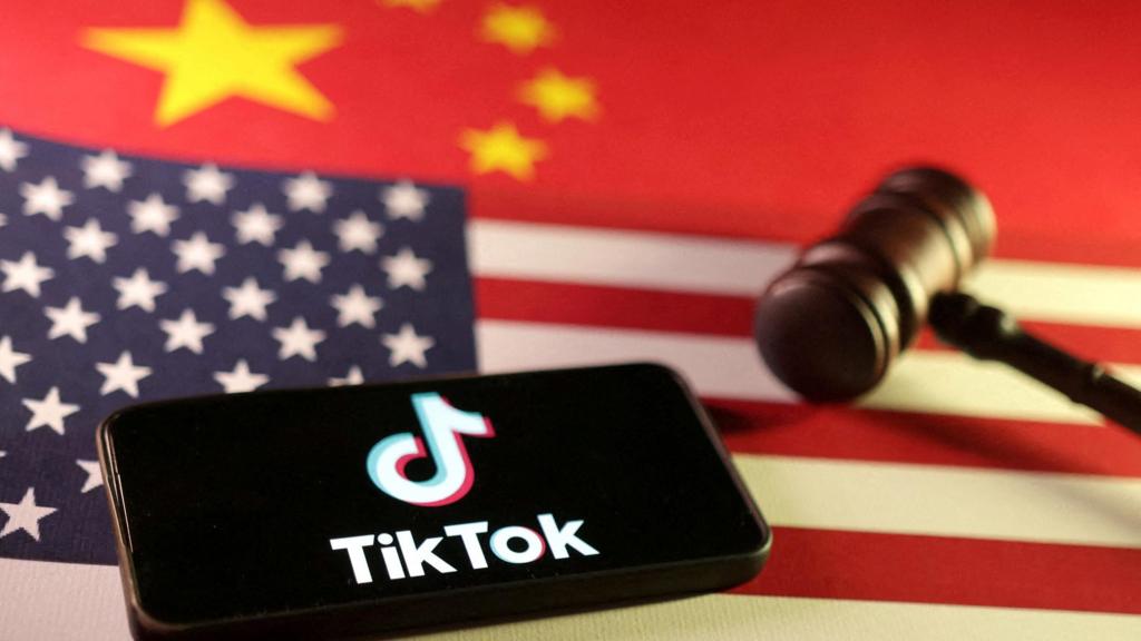 U.S., Chinese flags, TikTok logo and gavel are seen in this illustration