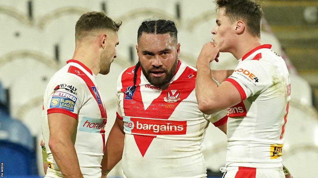 St Helens celebrate a try against Huddersfield