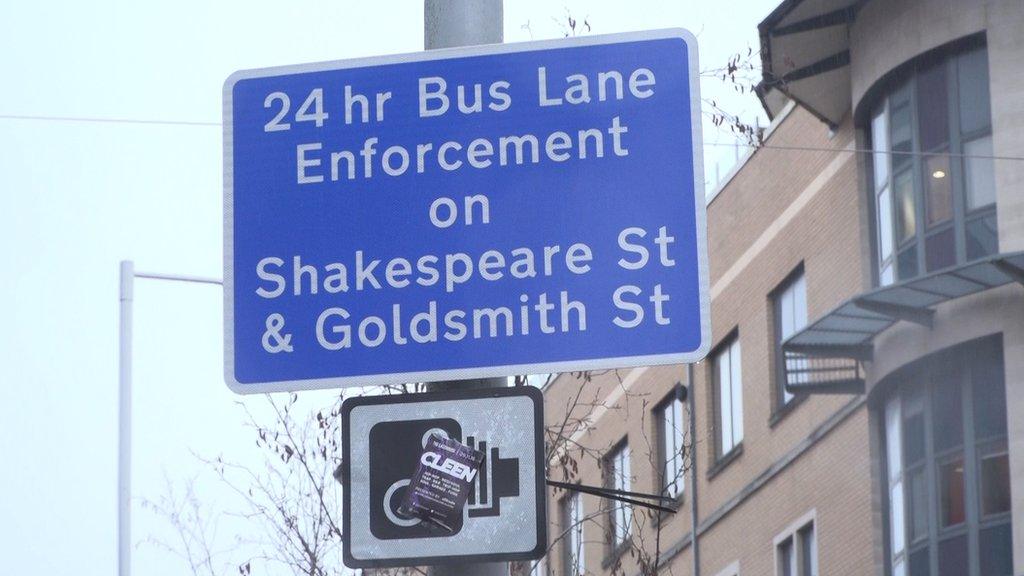 Bus lane warning sign